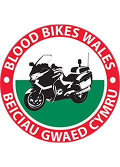 Blood Bikes Wales circular logo showing black touring motorcycle silhouette on green-and-white field with red outer ring